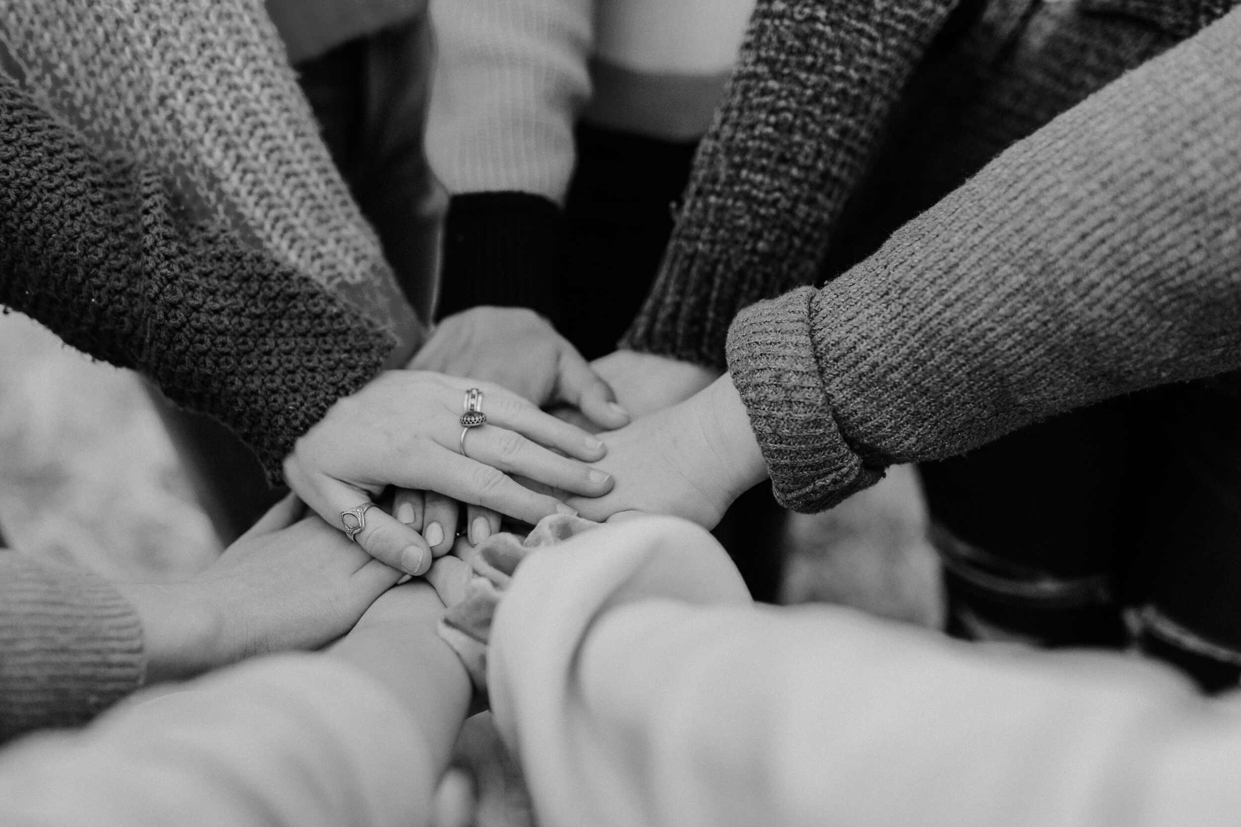 Residents and real estate investors putting their hands together